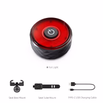 Smart rear bike light tracker box contents including mounting brackets and USB-C charging cable